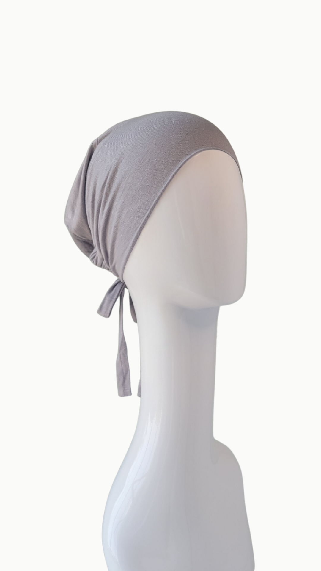 A comfortable and versatile basic tie-back undercap suitable for everyday wear. This undercap features a simple design with adjustable ties at the back, allowing for a customizable fit. 